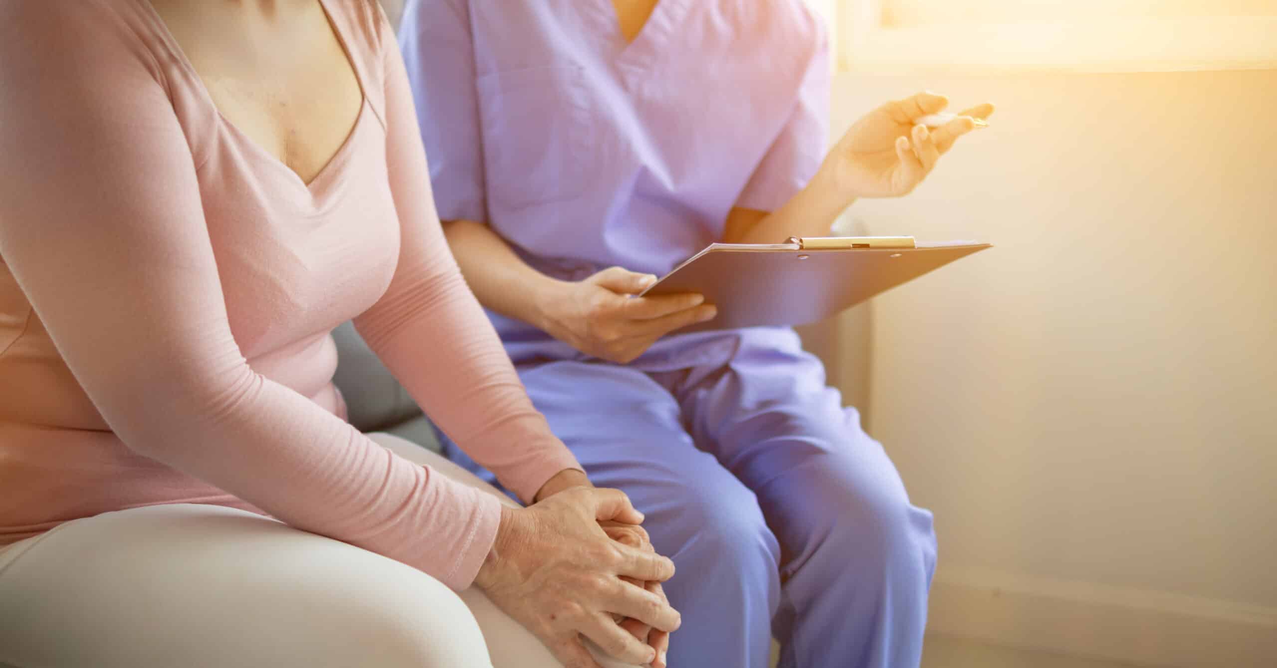 a woman sitting on a table